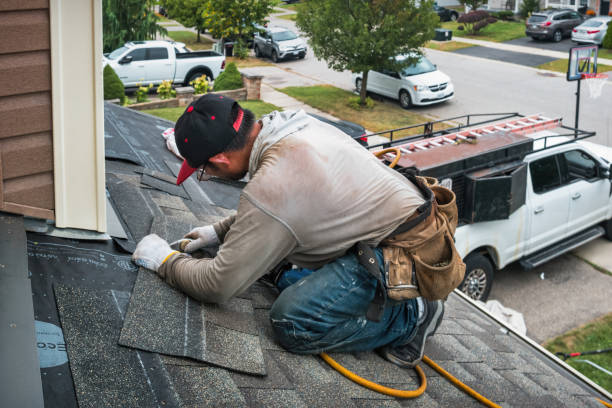 Professional Flat Roof Repair technician working in Westborough, MA